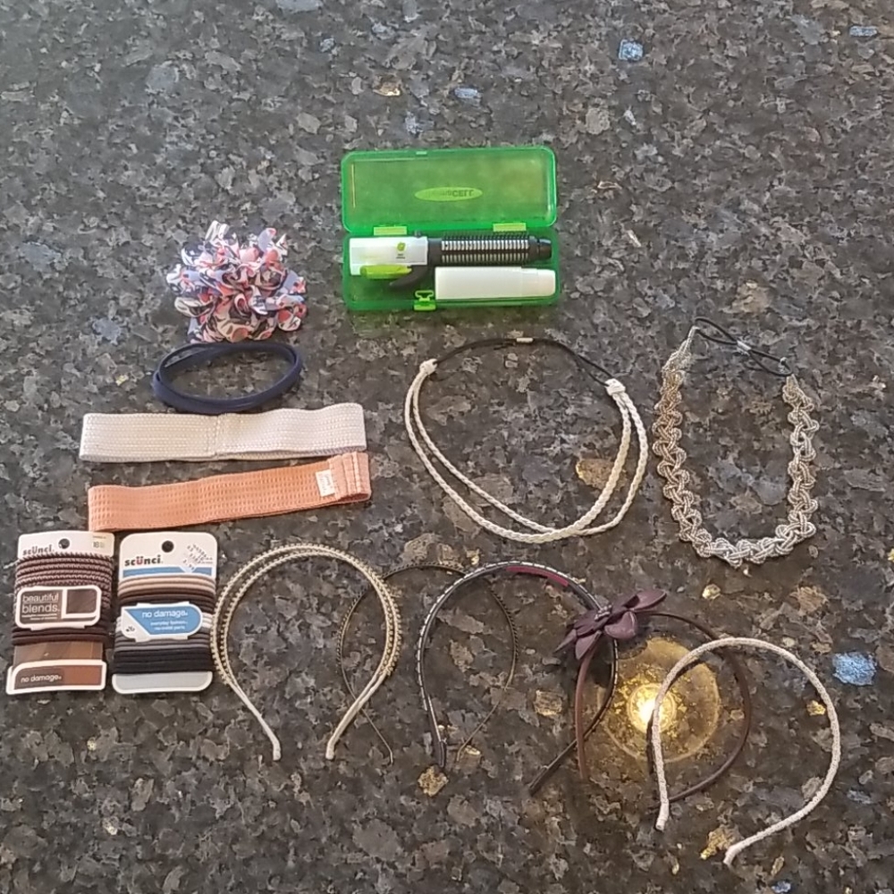 Hair bundle of headbands, ties, and curling iron